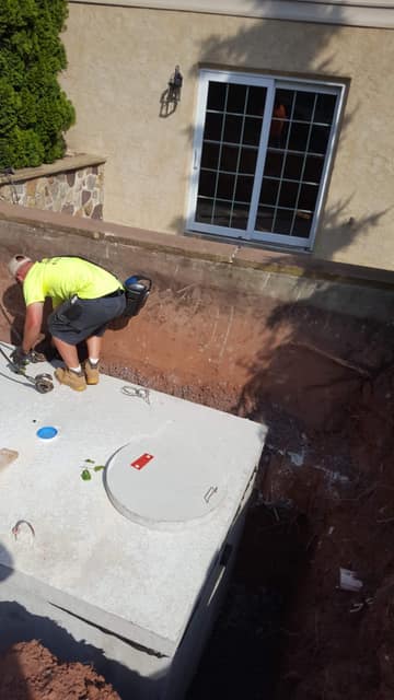 Septic Systems work by DeLuca Brothers Construction