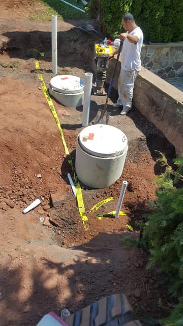 Septic Systems work by DeLuca Brothers Construction
