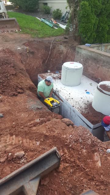 Septic Systems work by DeLuca Brothers Construction