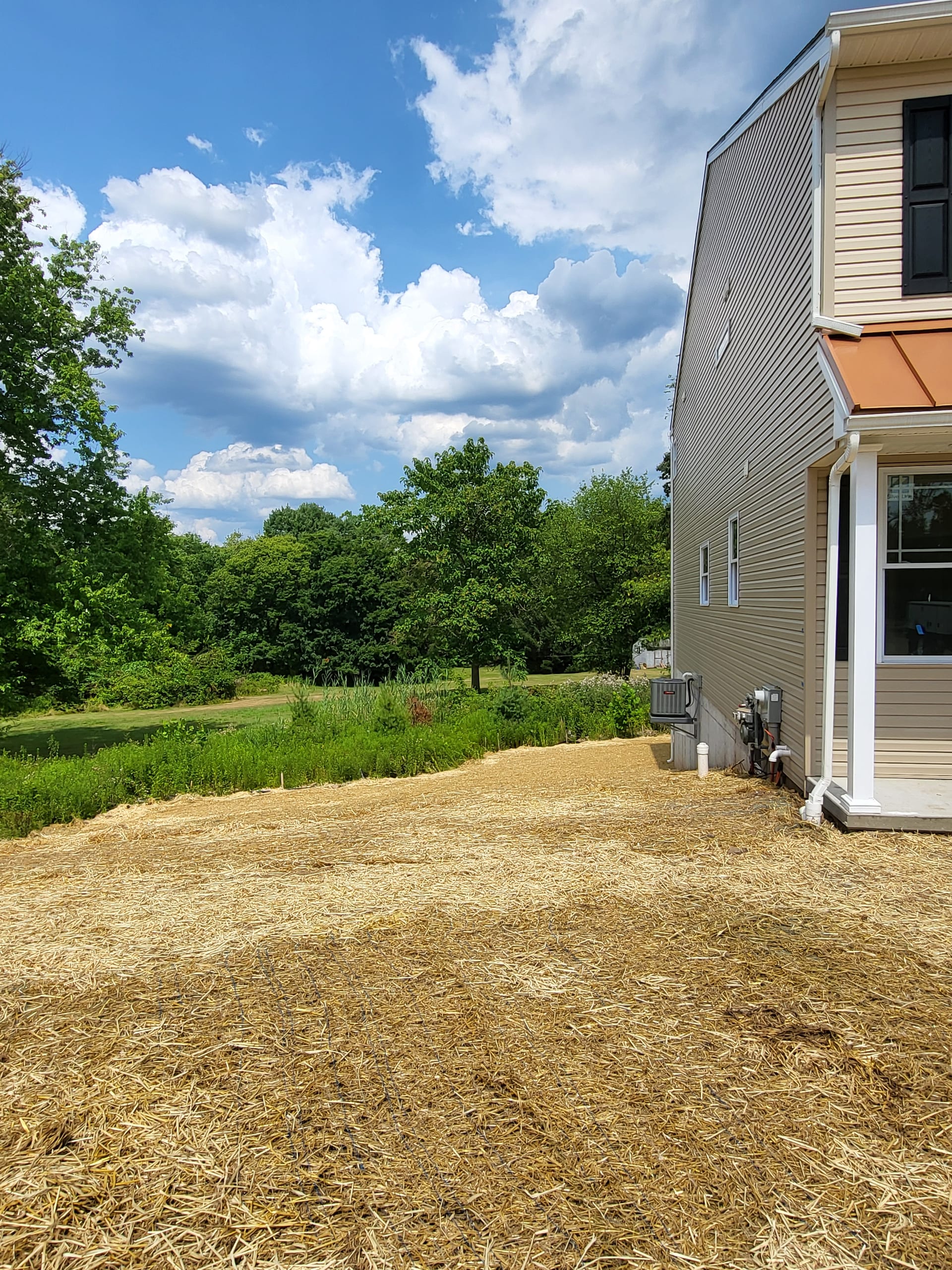 Raking & Seeding work by DeLuca Brothers Construction